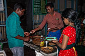Worship and puja offerings inside the Swamimalai temple. 